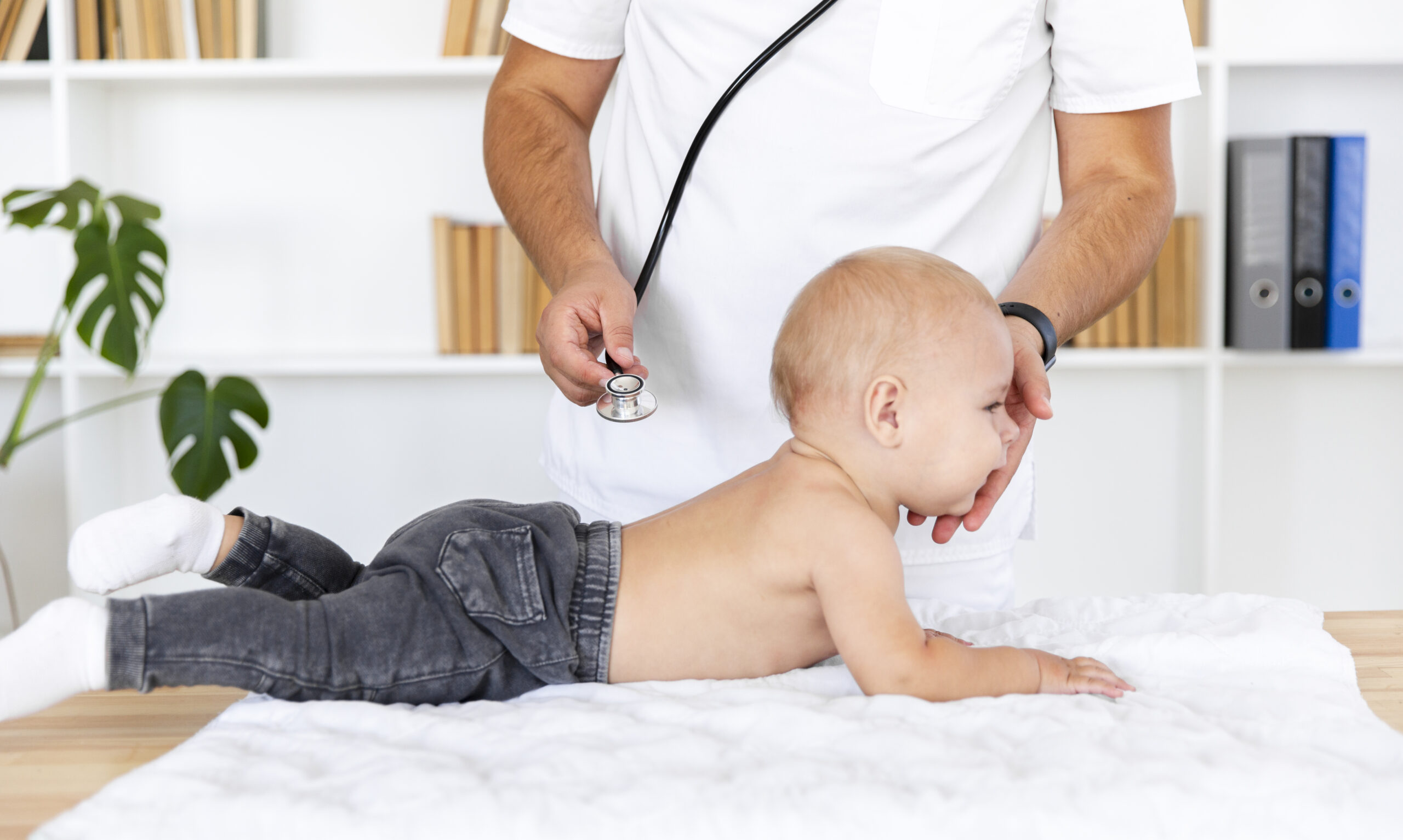 doctor-hands-listening-baby-patient-with-stethoscope